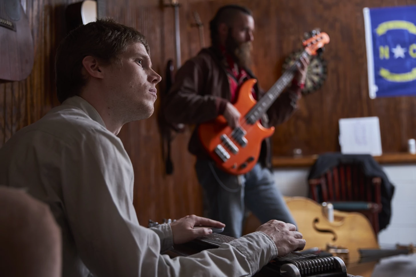 Side shot of the two Bens playing pedal steel and electric bass