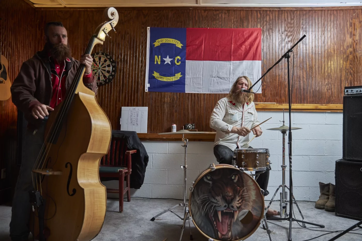 Ernie playing drums and Ben playing upright bass